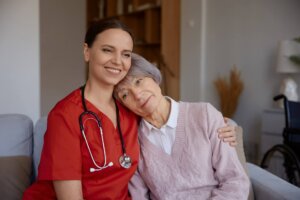 smiling happily caregiver hugging her old lady pat 2024 11 26 07 27 45 utc 3