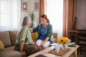 thoughful nurse examining senior patient with stet 2024 10 21 04 15 11 utc